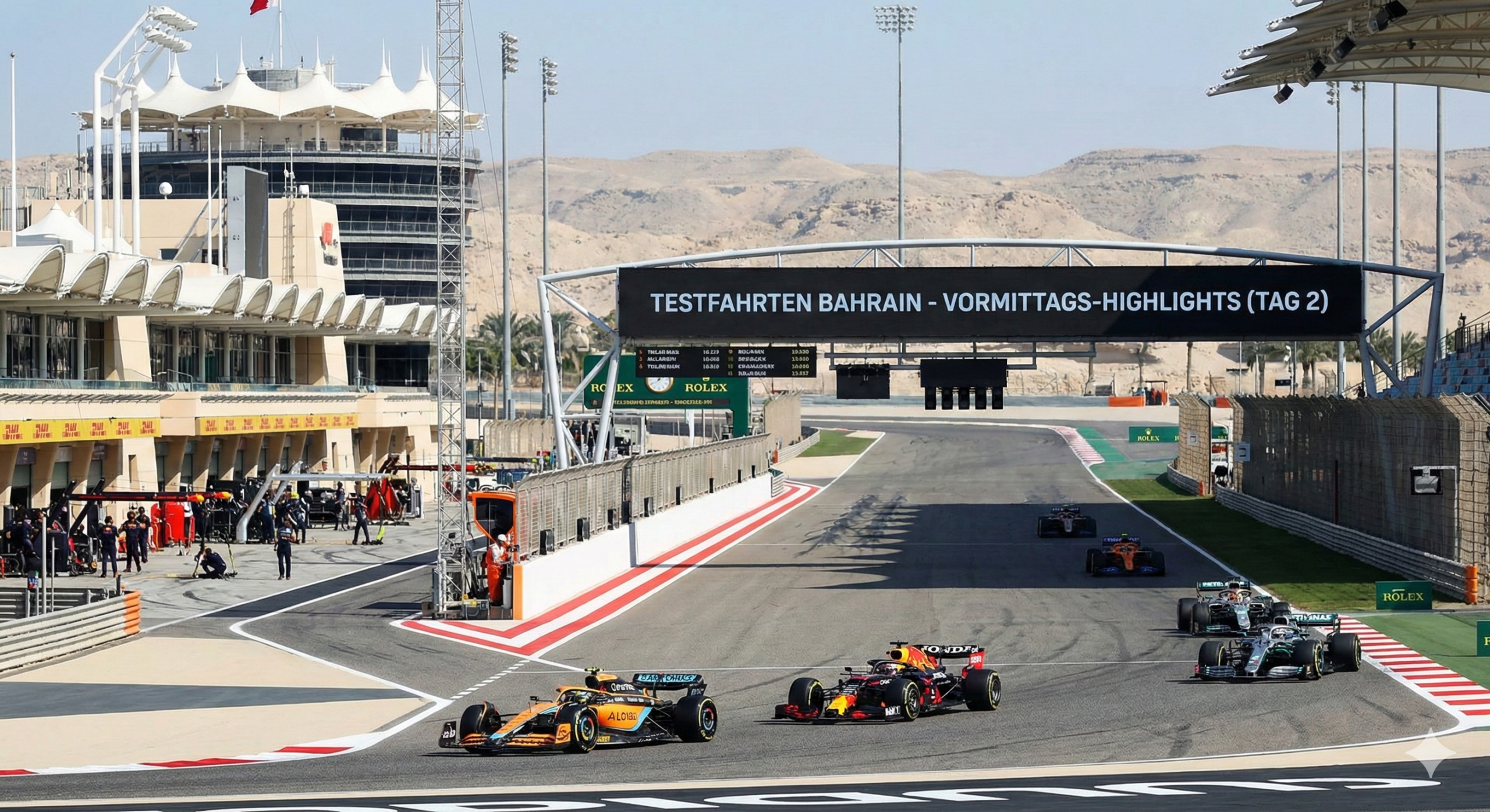 Formel-1-Testfahrten in Bahrain: McLaren, Red Bull und Mercedes auf der Rennstrecke, mit Pitlane und Wüstenhügeln im Hintergrund.